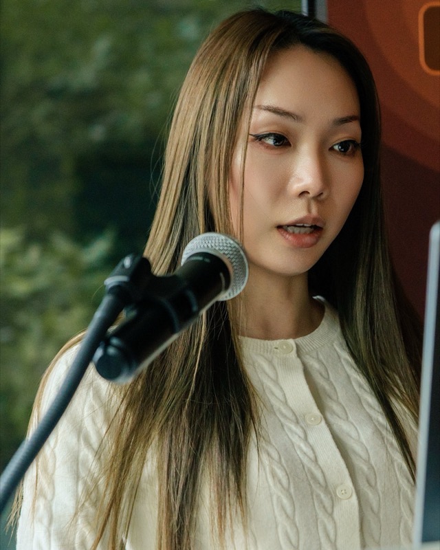Liz Zhang speaking at an event